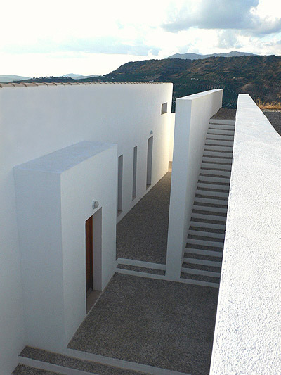 Casa Cerro - https://davidfern.lon1.cdn.digitaloceanspaces.com/media/images/Web-CCerro-rear-steps.jpg